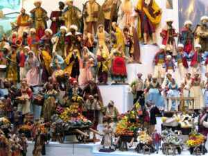 Details of one of the shops at San Gregorio Armeno - Naples showing a variety of small figurines: craftsmen, sellers and other nativity scene characters